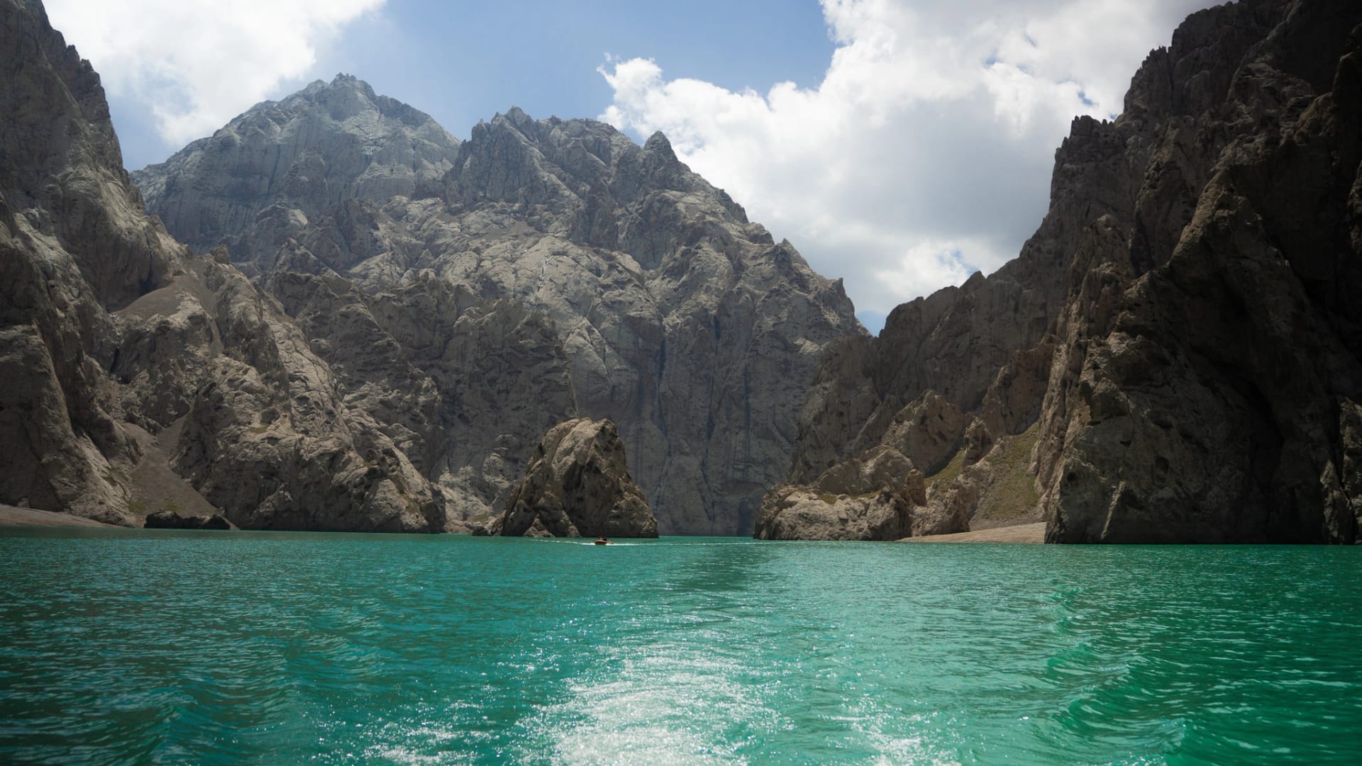 Kel-Suu lake and cliffs in the Kyrgyz border zone